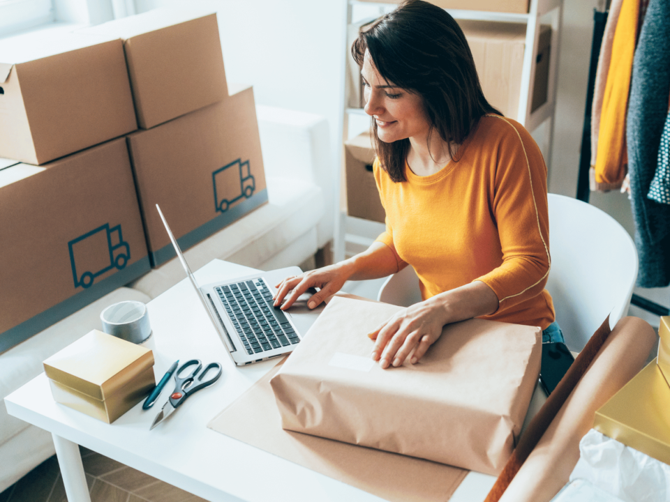 Small business owner woman packaging and tracking product: "Unlocking Efficiency: How Barcode Labels Empower Small Businesses to Curb Inventory Losses"
