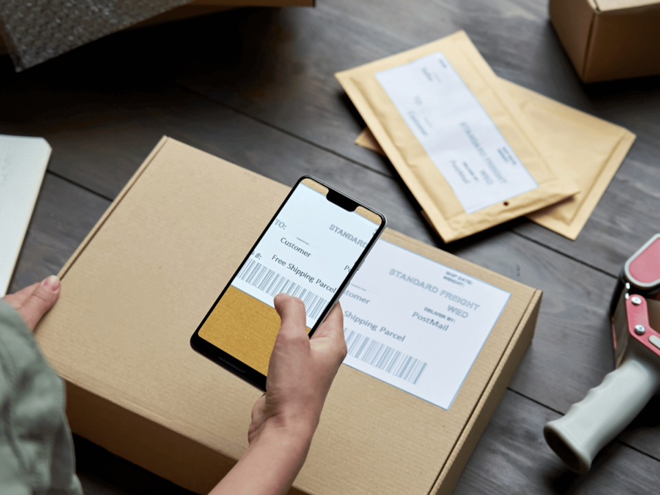 Scanning a barcode label on a box with a mobile phone: 9 Reasons to Resize Your Barcode Labels