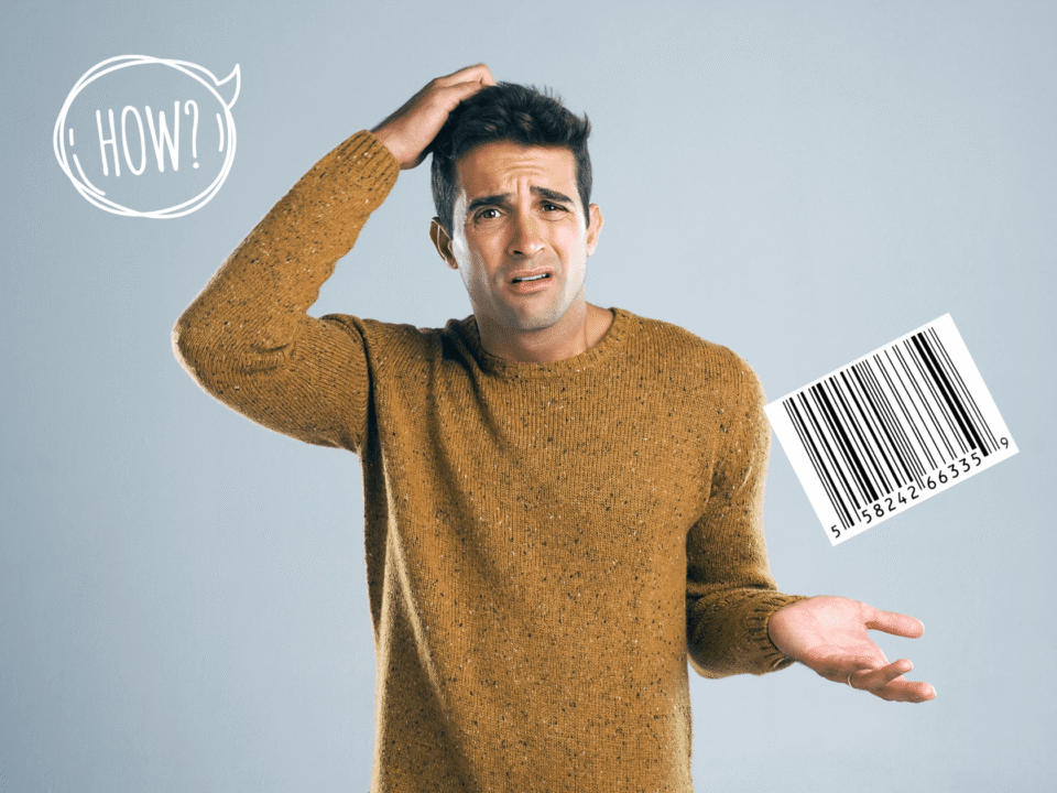 Young man scratching his head against a gray background with question mark bubble and single barcode label thinking - "how do I obtain a barcode for my product."